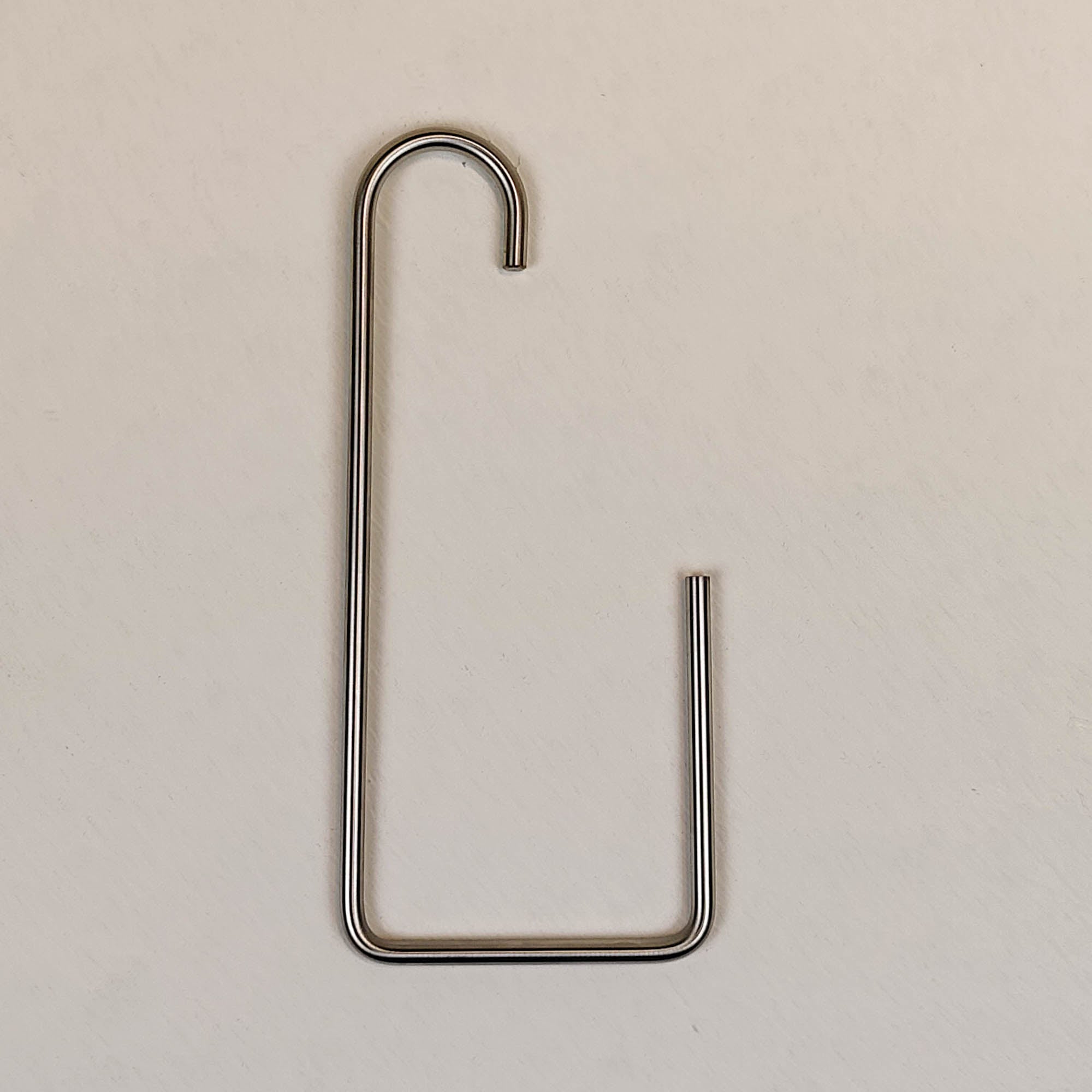 Porte-rouleau vertical gauche